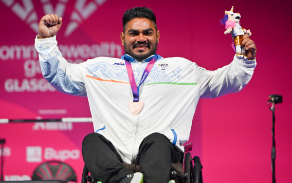 Jhandu Kumar receiving the bronze medal at the Commonwealth Games