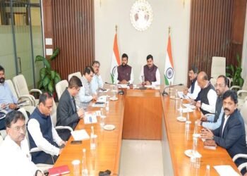 Chief Minister Dr. Mohan Yadav and Union Minister for Civil Aviation Shri Kinjarapu Ram Mohan Naidu reviewing airport construction activities.