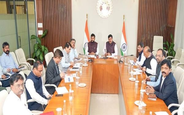 Chief Minister Dr. Mohan Yadav and Union Minister for Civil Aviation Shri Kinjarapu Ram Mohan Naidu reviewing airport construction activities.