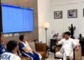 Union Minister Jyotiraditya Scindia and Mirabai Chanu during their meeting